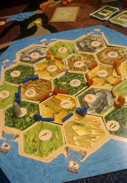 358px-Settlers_of_Catan_mid-game.jpg